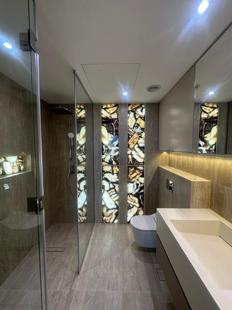 Projects We Have Done 33 Bathroom renovation with backlit precious stone feature at Canal Front CF09A by ASM Interiors