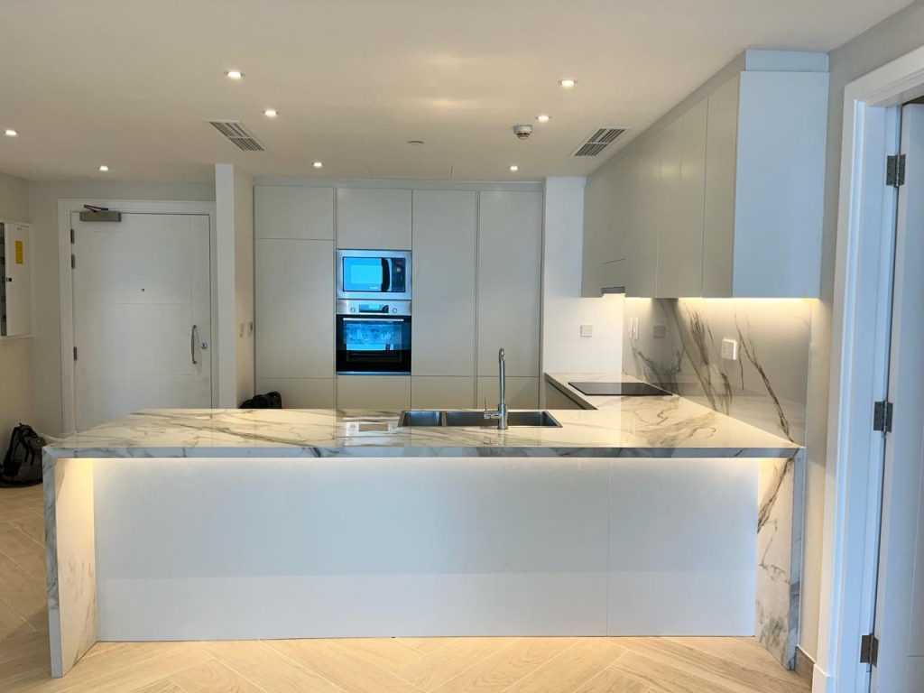Palm Jumeirah Marina Residence 6 Renovation – Apartment Renovation in Dubai 1 Kitchen renovation with waterfall island Dubai Marina