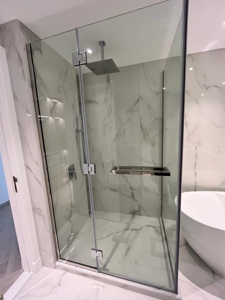 Shower glass installation at Palm Jumeirah Marina Residence 6 by ASM Interiors Dubai
