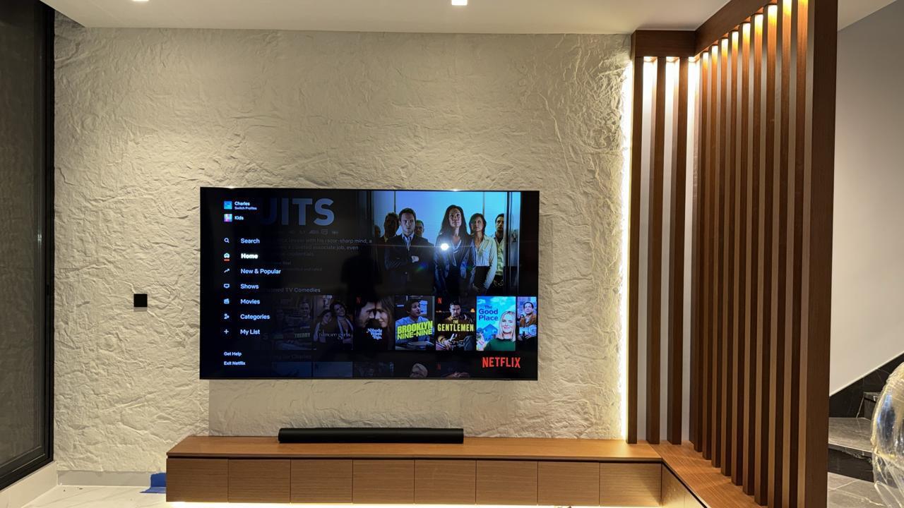 Custom TV feature wall by ASM Interiors Dubai