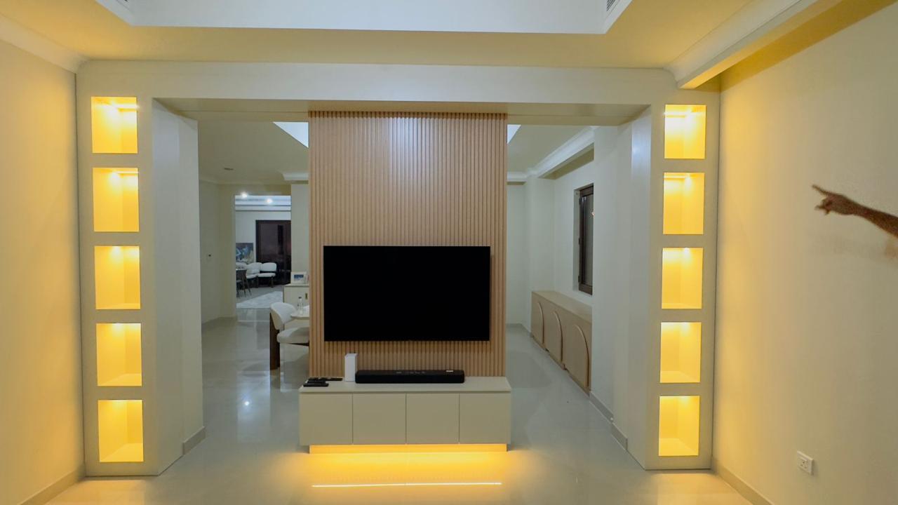 Media wall with LED lighting by ASM Interiors Dubai