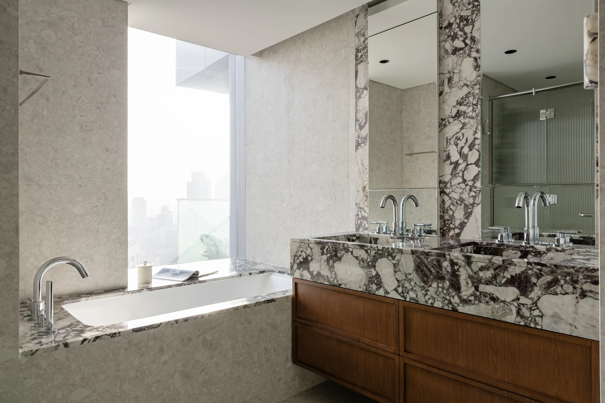 Opera Grand Apartment Renovation – Downtown Dubai 3 Stone-lined bathtub and double vanity at Opera Grand, Downtown Dubai
