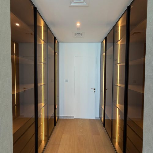 Illuminated custom wardrobe corridor at Canal Front CF09A
